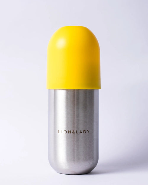 Silver and yellow bottle with 'LION&LADY' branding on a white background